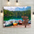 Beautiful cabin artwork canvas print of colorful boats on Lago Di Fusine Lake in Italy. Italian alps forest art personalized with custom wood crossroads sign with carved wooden planks personalized with names or dates.
