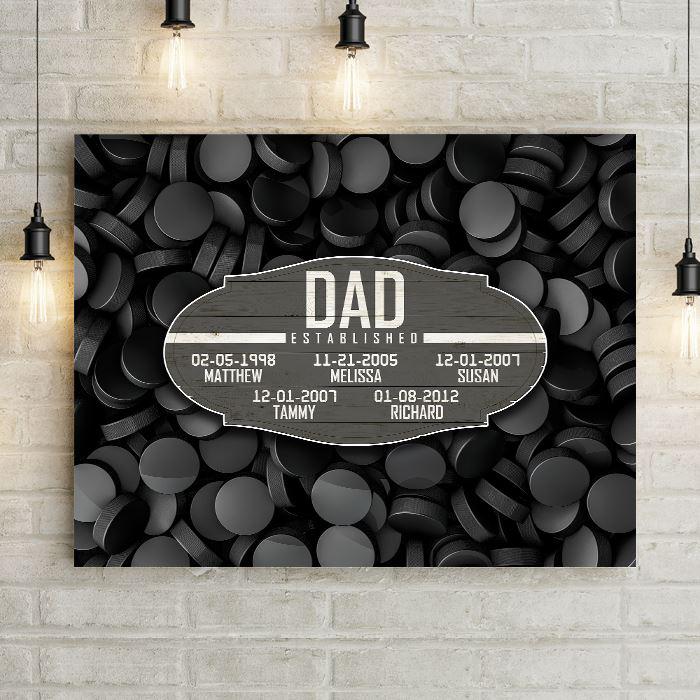 Hockey Dad Established Date Canvas Print Wall Hanging.  Beautiful Home Decor, Office Decoration, or Man Cave Sign.  Best Father's Day Gift Idea for #1 Dad. Carved wood Sign for sports enthusiast on a background of sports-themed wall art.