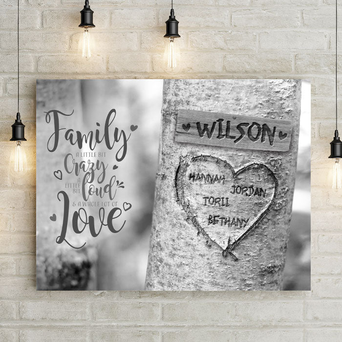 Family a little crazy a little loud a lot of love personalized canvas wall art with custom names carved on wood plank name sign and heart on aspen tree. Medium, large, or extra large canvas wall art for family room.