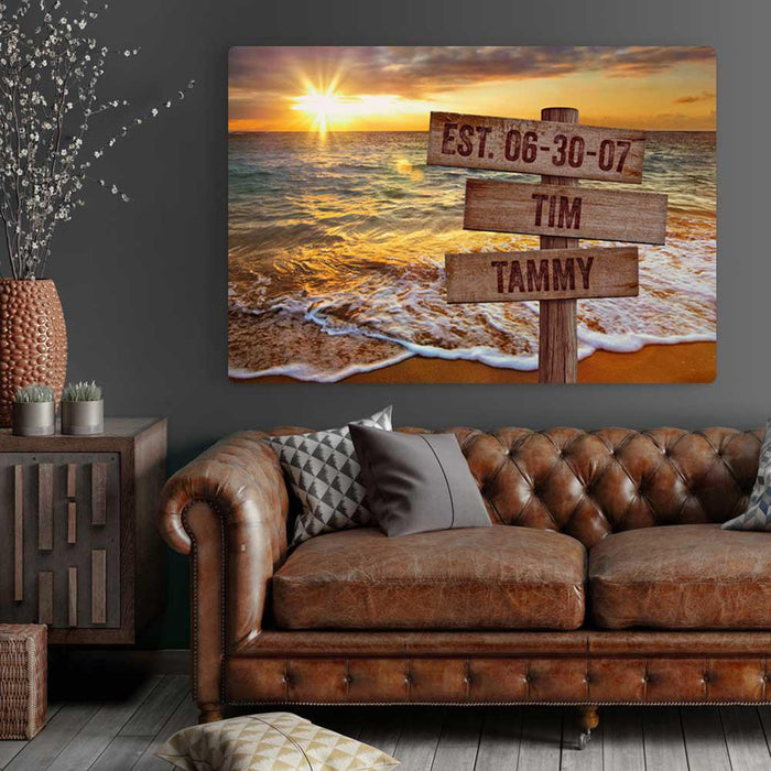 Beach Sunset Canvas Personalized Wall Art. Vibrant orange and pink sky  highlights our multi name sign on this extra large ocean sunset canvas. Alwo available as a black and white ocean sunset canvas print. Custom family name canvas makes the best family gifts.